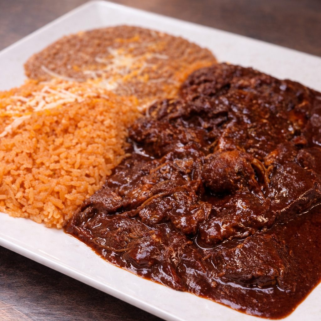 Carnitas con Mole.